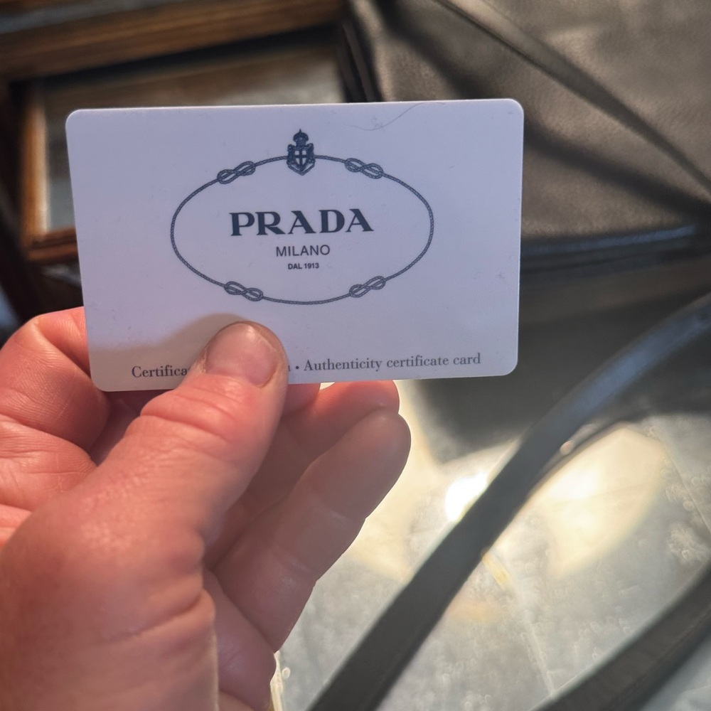 Prada Black Leather cross body Handbag